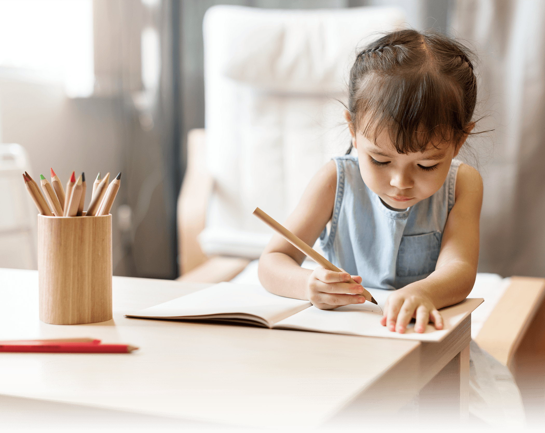 image of a little girl doing her homework